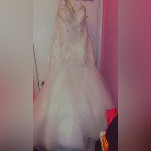 Only wore once  strapless dress build in bra with a corset